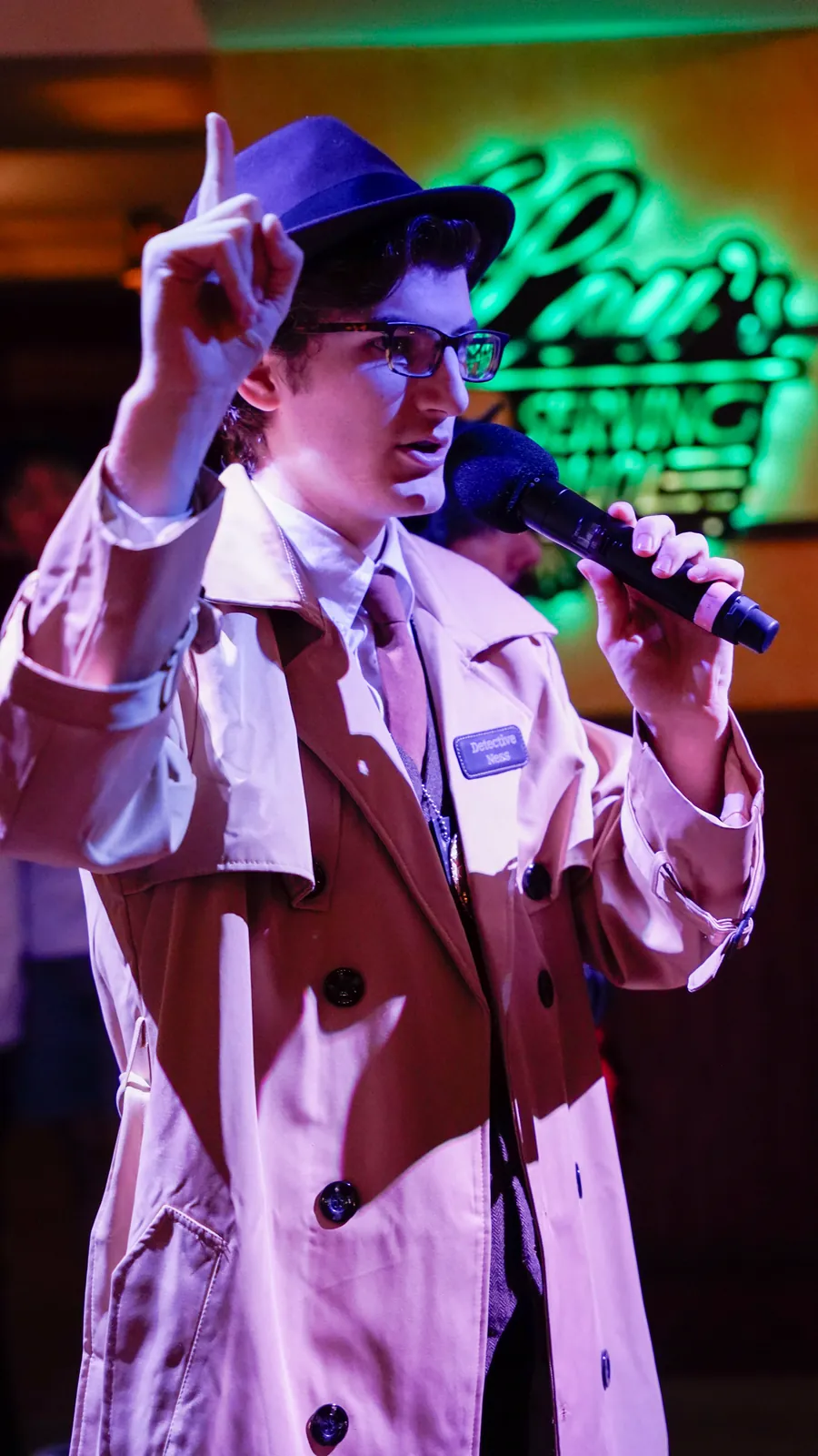 A Murder Mystery Company actor working the room at a Albuquerque show